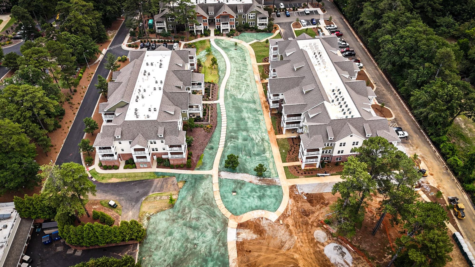 Aerial view of hydroseeded grounds at a multifamily apartment complex