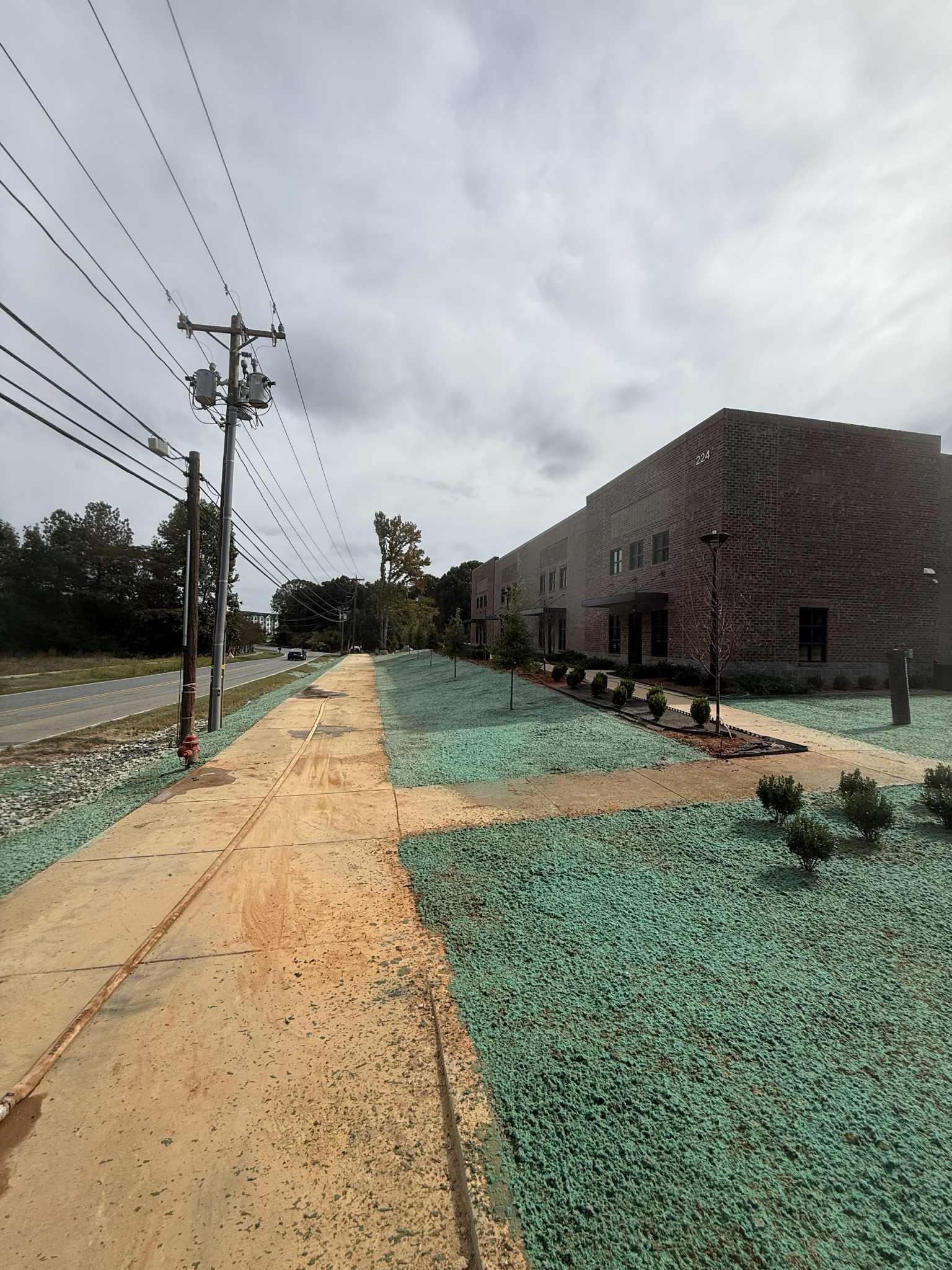 Hydroseeded frontage strip along a commercial building near Statesville, NC
